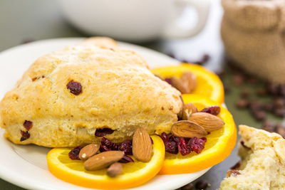This is a delicious fruit and nut scone that melts in your mouth. Filled with currant and nuts, the texture in this scone will make you come back for more. Remember to store scones in a container after 30 minutes of cooling to preserve the moisture.