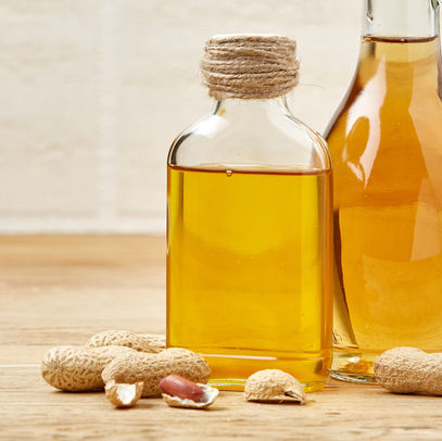 Peanut oil is a liquid fat obtained from pressed peanuts seeds.