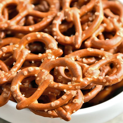 Hard Pretzels are uniquely shaped baked snacks manufactured from a lean and stiff fermented wheat flour dough.