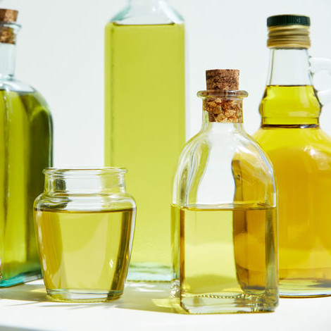 Oil is a plant-derived fat that remains liquid at room temperature and is made up of a mixture of triglycerides.