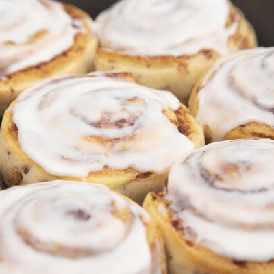 Particle Size A cinnamon roll is a sweet baked dough filled with a cinnamon-sugar filling.