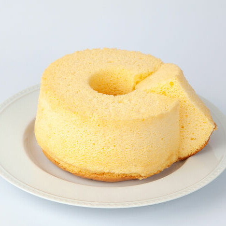 A chiffon cake is a sweet baked good which combines a batter with a foam-type (sponge) cake.