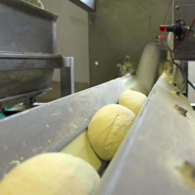 Dough rounding is used in commercial baking to produce ball-shaped pieces.